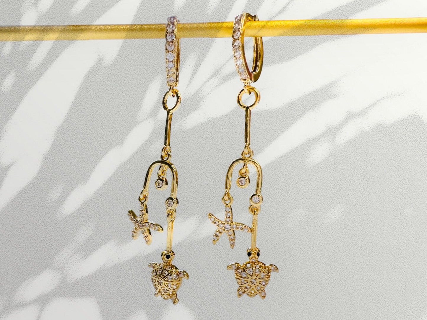Boucles d’oreilles étoiles de mer tortue